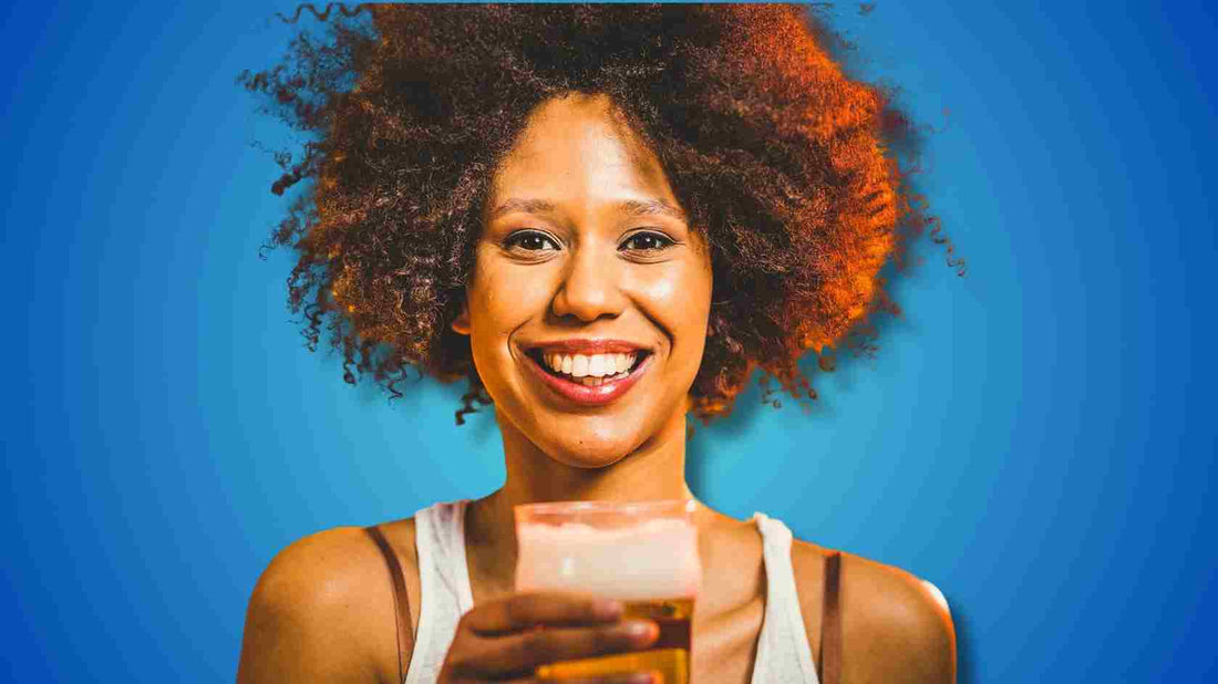 A woman drinking beer