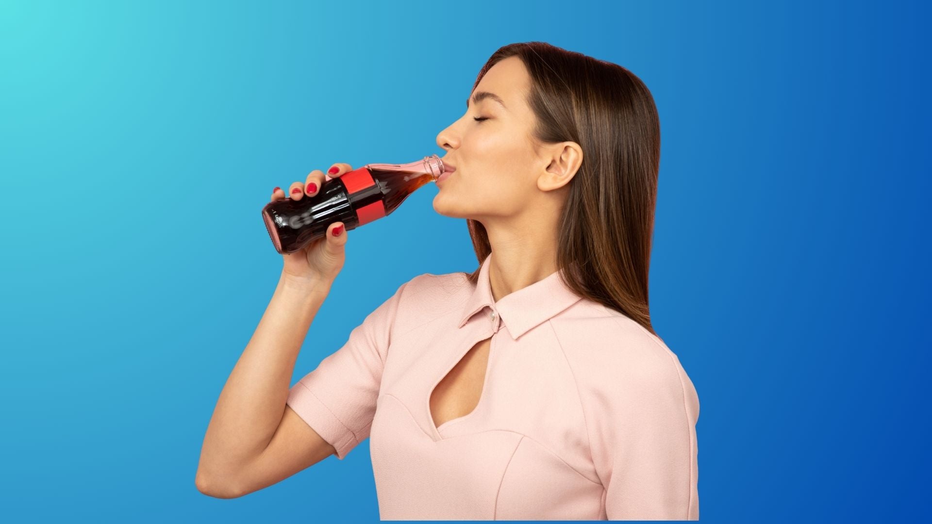 A woman drinking soda