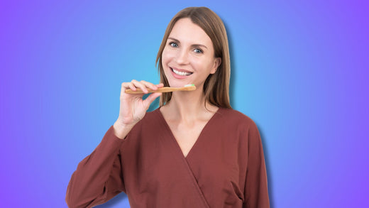 A woman brushing her teeth