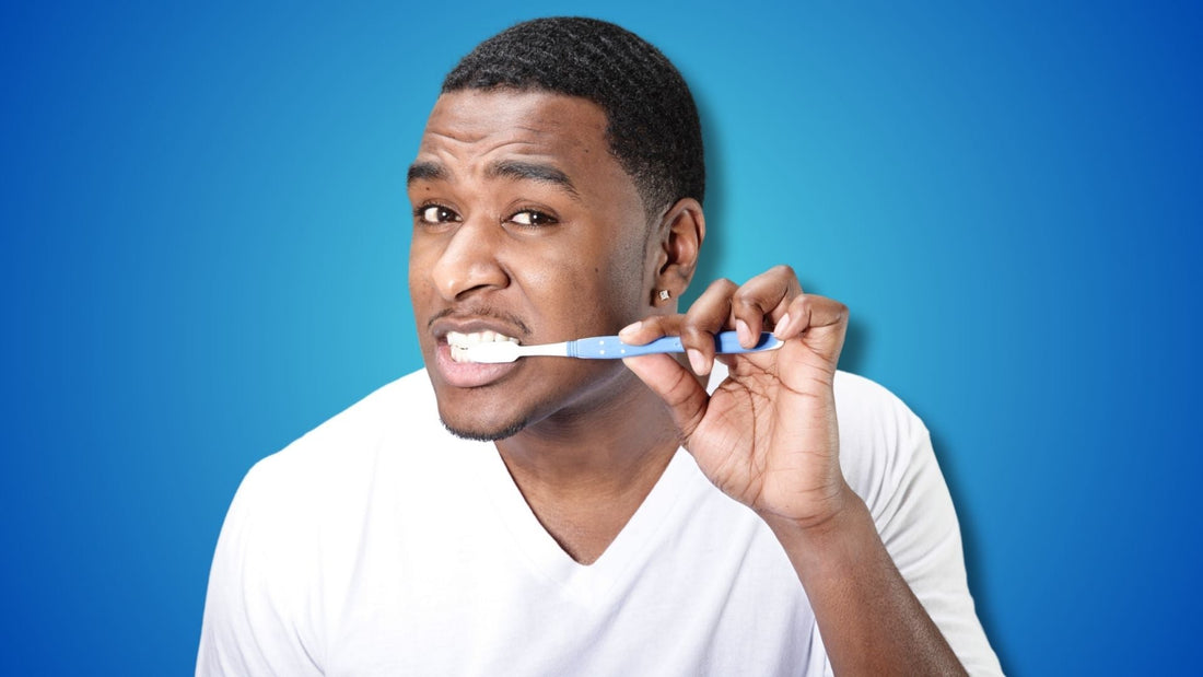 A Man Brushing His Teeth
