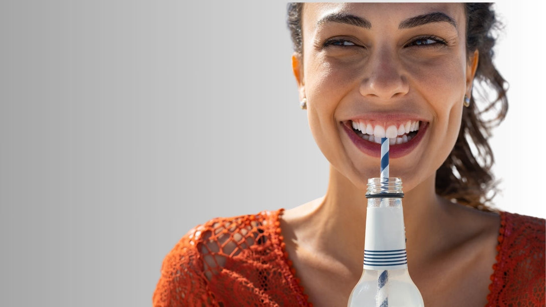 A woman drinking sprite