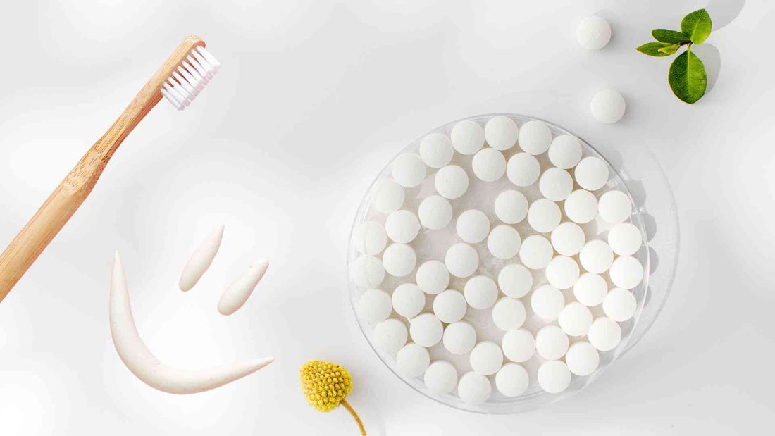 A toothbrush and toothpaste tablets